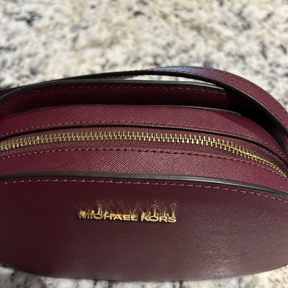 Michael Kors Plum Saffiano Leather Oval Crossbody Bag with Gold Hardware - Picture 7 of 8